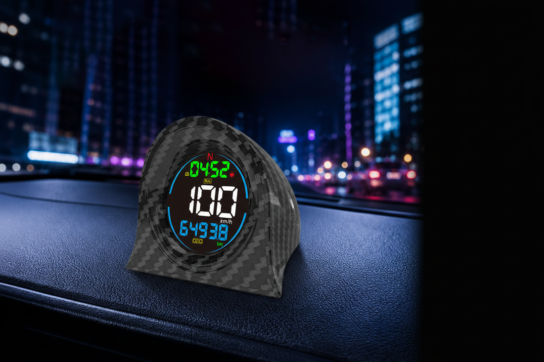 KUOWEIHUD F2 GPS digital speedometer displayed on a car dashboard at night, showing speed and driving data with colorful LED display