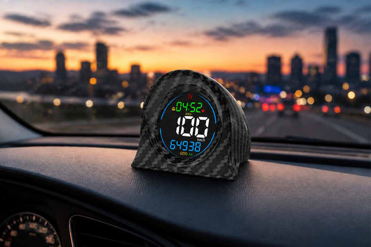GPS digital speedometer for cars displaying accurate speed on a dashboard during sunset driving