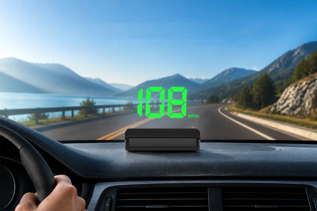 K1 GPS HUD speedometer displaying real-time speed on windshield while driving on a mountain road