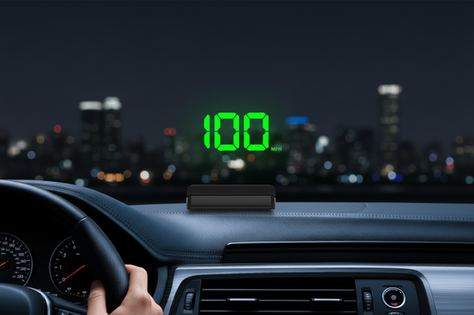 K1 Head-Up Display projecting green digital speed reading on car windshield at night, with city lights in the background