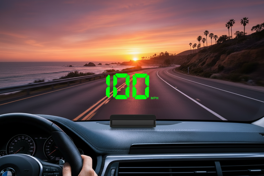 K1 HUD heads-up display mounted on car dashboard, projecting green digital speed reading, with sunset coastal highway in the background — K1 HUD Installation Guide