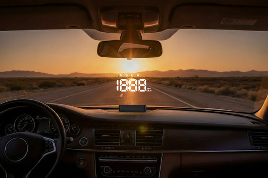 Driver's view of a car heads-up display HUD projected on windshield showing speed and navigation on a long-distance highway road trip